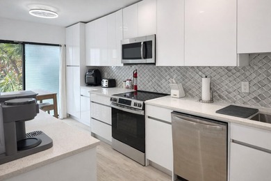Stunning remodeled modern, spacious, and bright two-story condo - photo 6