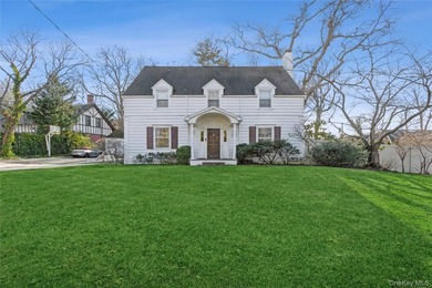 Step into this timeless colonial-style home, featuring five - photo 2