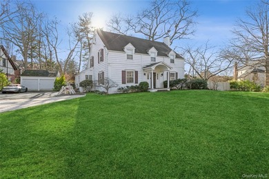 Step into this timeless colonial-style home, featuring five - photo 4