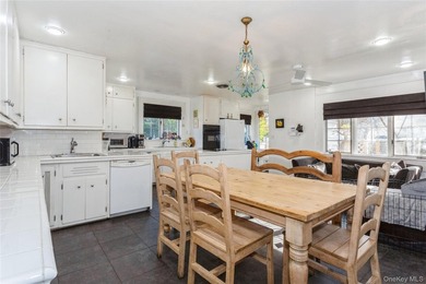 Step into this timeless colonial-style home, featuring five - photo 6