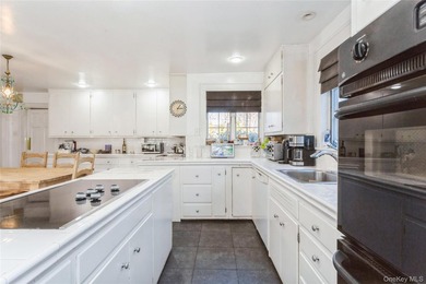 Step into this timeless colonial-style home, featuring five - photo 9