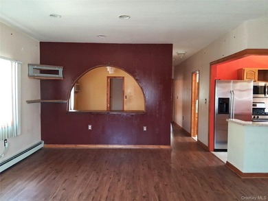Welcome to this spacious two-family home nestled in the heart of - photo 4