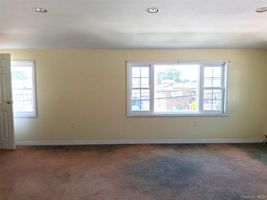 Welcome to this spacious two-family home nestled in the heart of - photo 6