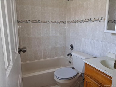 Welcome to this spacious two-family home nestled in the heart of - photo 8
