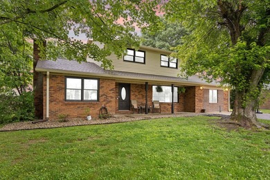 Welcome to this beautifully remodeled 4-bedroom, 1 full and 1 - photo 1