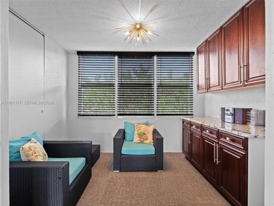 Turnkey, furnished, and top-floor living in a well-maintained