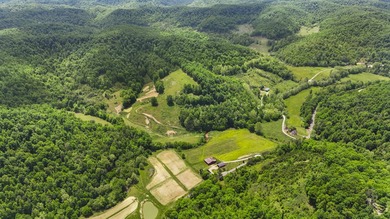 Tucked away among rolling valleys, towering ancient cliffs, and - photo 3