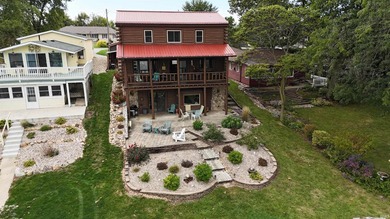 Welcome to 52 EMS B40 Lane. This Lakefront log sided home is - photo 3