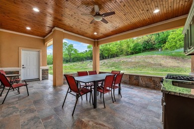 Welcome to this Mediterranean-style one-story home in the - photo 2