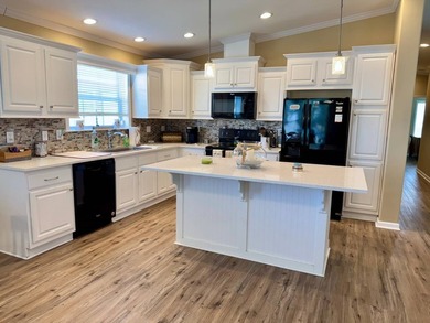 This 2018 home features 3 bedrooms, 2 baths, and a charming - photo 11