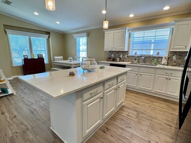 This 2018 home features 3 bedrooms, 2 baths, and a charming - photo 13