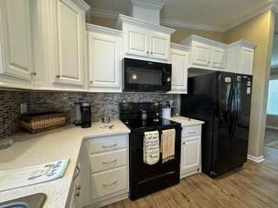 This 2018 home features 3 bedrooms, 2 baths, and a charming - photo 14