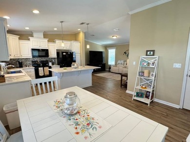 This 2018 home features 3 bedrooms, 2 baths, and a charming - photo 17