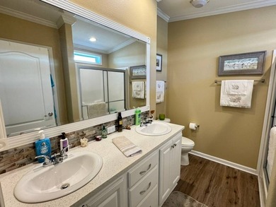 This 2018 home features 3 bedrooms, 2 baths, and a charming - photo 23