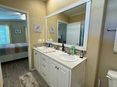 This 2018 home features 3 bedrooms, 2 baths, and a charming - photo 25