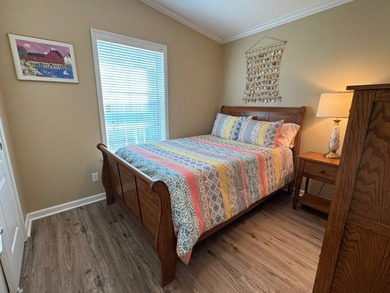 This 2018 home features 3 bedrooms, 2 baths, and a charming - photo 26