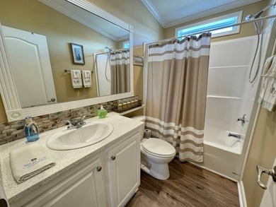 This 2018 home features 3 bedrooms, 2 baths, and a charming - photo 29