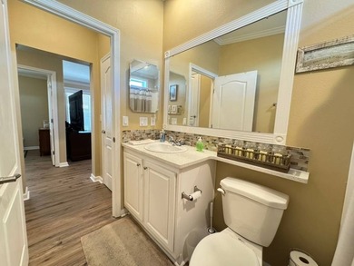This 2018 home features 3 bedrooms, 2 baths, and a charming - photo 30