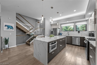 Seven years young and still turning heads, this modern townhome - photo 8