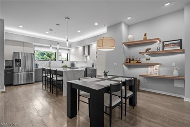 Seven years young and still turning heads, this modern townhome - photo 9