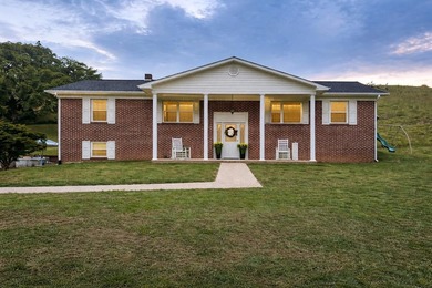 This beautiful brick home sits on more than 24 acres of scenic - photo 1