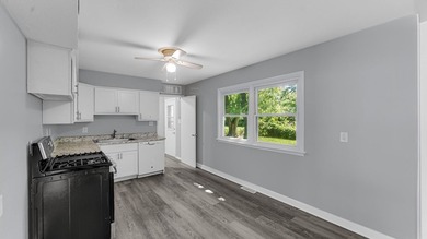 Charming ranch-style home featuring 3 bedrooms, 1.5 baths, and - photo 11