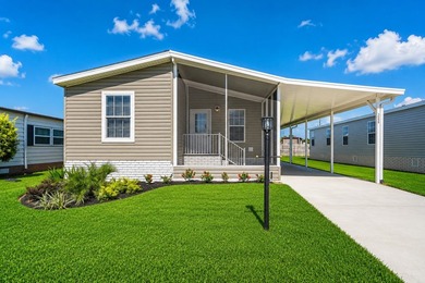 Step into The Heron, a brand-new, move-in ready, 2026 home - photo 1