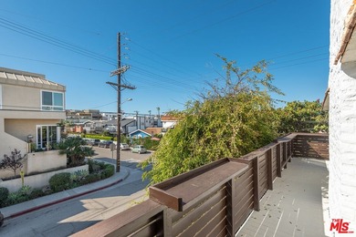 Just steps from the sand, this beautiful triplex sits on a prime - photo 16