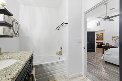 Wel maintained 3BR/2BA home with a 2 car garage in the gated - photo 17