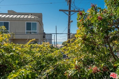 Just steps from the sand, this beautiful triplex sits on a prime - photo 18