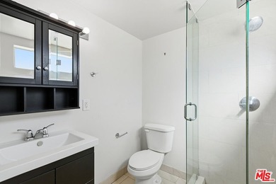 Just steps from the sand, this beautiful triplex sits on a prime - photo 25