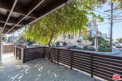 Just steps from the sand, this beautiful triplex sits on a prime - photo 27