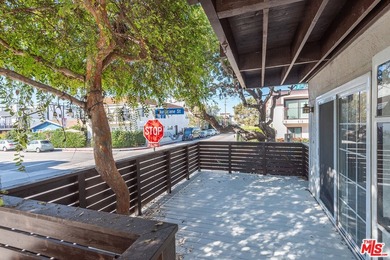 Just steps from the sand, this beautiful triplex sits on a prime - photo 28