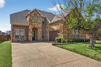 Beautifully maintained and move-in ready home in the highly - photo 1