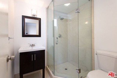 Just steps from the sand, this beautiful triplex sits on a prime - photo 40
