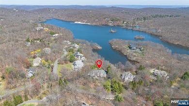 Wake up each day to breathtaking lakefront views in this - photo 3