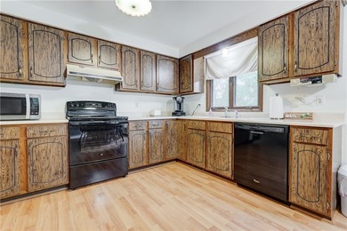 OPEN THE DOOR TO EASY ONE-FLOOR LIVING! This well-maintained - photo 11