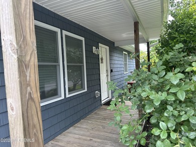 Totally renovated 2023. Open kitchen/living room floor plan with - photo 1