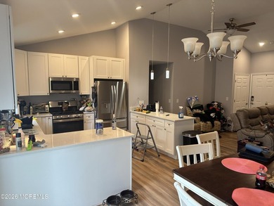 Totally renovated 2023. Open kitchen/living room floor plan with - photo 6
