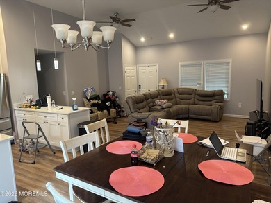 Totally renovated 2023. Open kitchen/living room floor plan with - photo 7