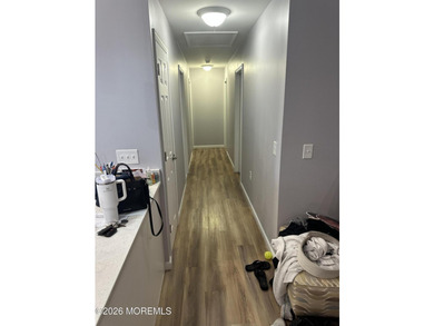 Totally renovated 2023. Open kitchen/living room floor plan with - photo 9