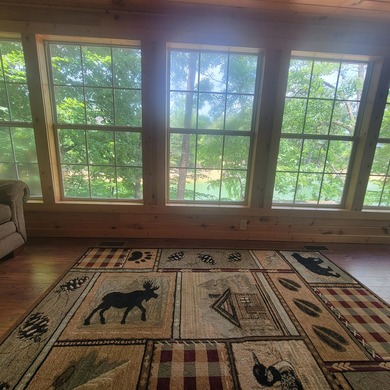 Move in ready lake cabinpletely remodeled with flooring - photo 8