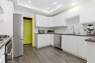 Nestled in a quiet cul-de-sac, this highly desirable front unit - photo 8