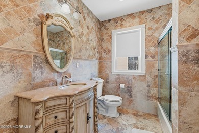 Welcome to 48 Neptune Avenue, an exceptional coastal residence - photo 12
