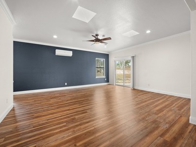 Well designed 4- bedroom, 3-bath home with an oversized garage