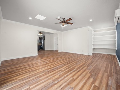 Well designed 4- bedroom, 3-bath home with an oversized garage