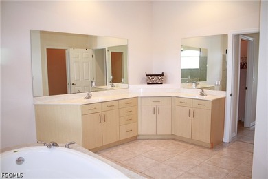 This spacious 3-bedroom + den, 2-bath pool home comes with an - photo 22