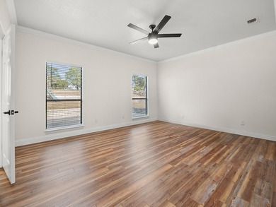 Well designed 4- bedroom, 3-bath home with an oversized garage