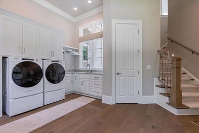 IMPECCABLY MAINTAINED CUSTOM HOME IN THE COVETED PARROTTS POINT - photo 29