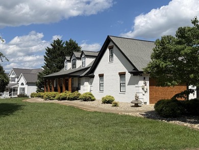 Experience luxury lakefront living at its finest on beautiful - photo 2